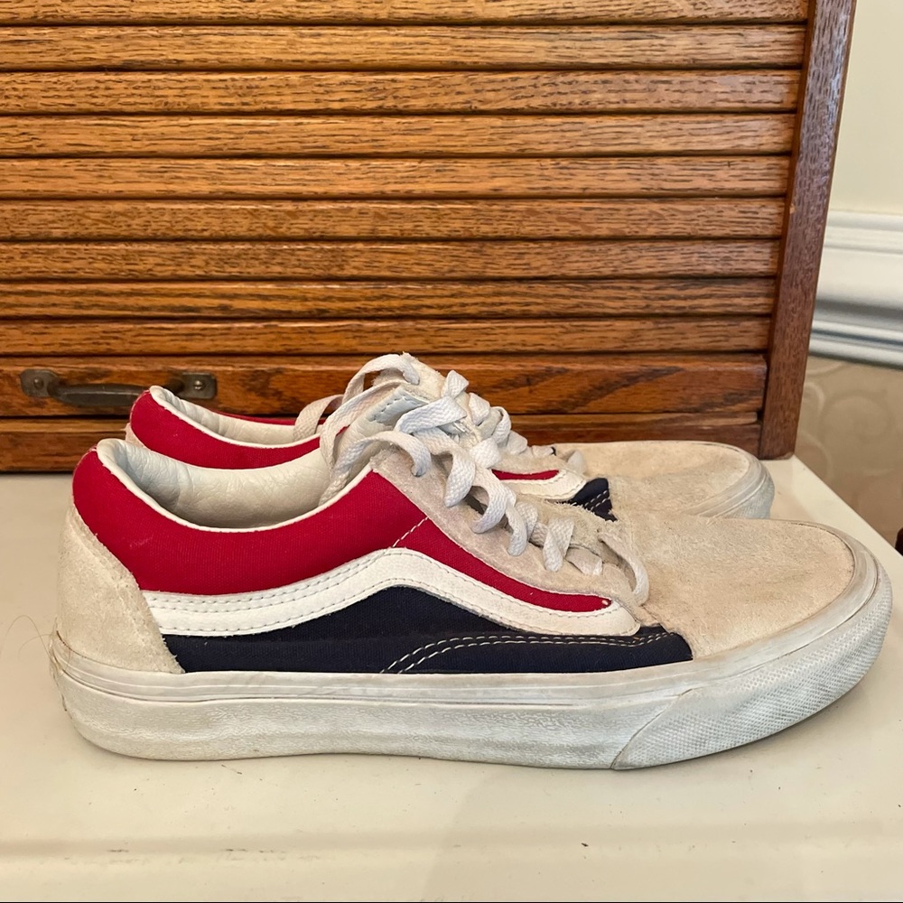 Red white and blue low top old school vans